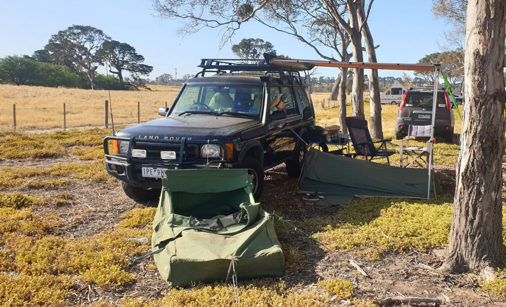 Camping with car with awning and swag