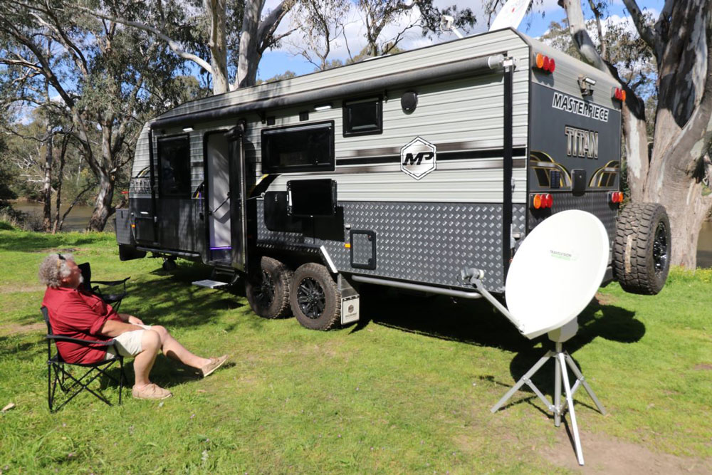 Caravan with a satellite dish