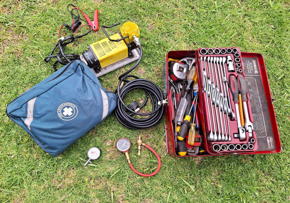 A good quality tool kit, first aid kit, ARB portable air compressor, tyre deflation kit and pressure gauge