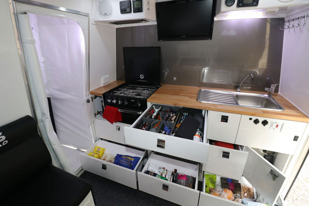 Hybrid kitchen, storage ensuite and entertainment systems